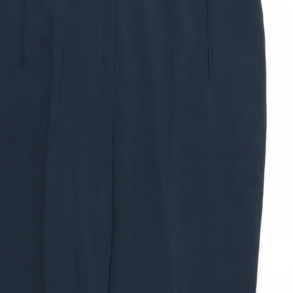 Close-up detail of Preworn women’s blue rayon trousers, size UK 38, in, 28-inch leg