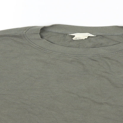 Close-up detail of H&M girls’ green pullover sweatshirt, size 13-14, years