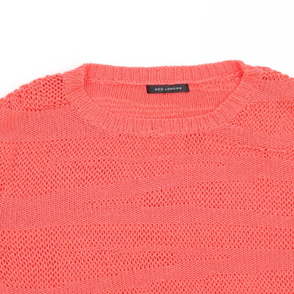 Close-up detail of QED London women’s red jumper, size UK 12