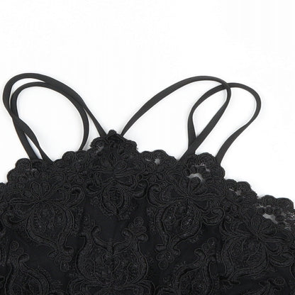 Close-up detail of River Island women’s black cropped tank, size UK 8