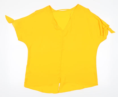 Back view of Peacocks women’s orange basic blouse, size UK 16