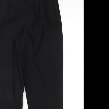 Close-up detail of PRETTYLITTLETHING women’s black trousers, size UK 6, 26-inch leg