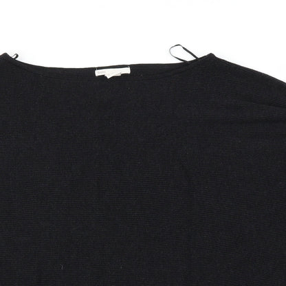 Close-up detail of H&M women’s black jumper, size S