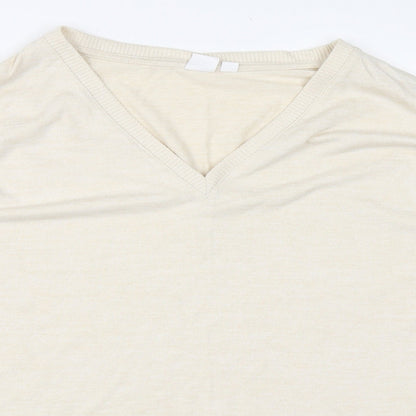 Close-up detail of Gap women’s beige jumper, size L