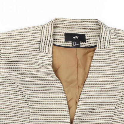 Close-up detail of H&M women’s beige jacket blazer, size UK 12