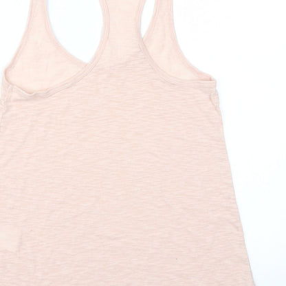 Brand and care label for H&M women’s pink basic t-shirt, size XS
