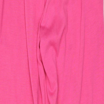 Brand and care label for Reebok women’s pink sweatpants, size S, 24-inch leg