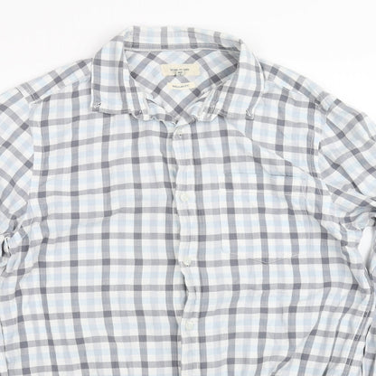 Close-up detail of River Island women’s blue check basic button-up, size UK 2