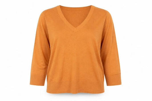 Front view of M&Co women’s orange jumper, size M