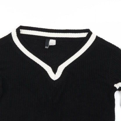 Close-up detail of H&M women’s black jumper, size XS