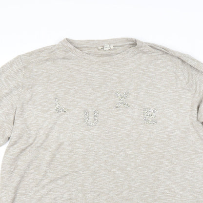 Close-up detail of River Island women’s beige jumper, size UK 18