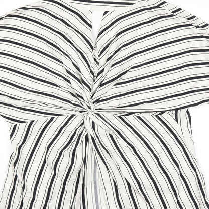 Brand and care label for River Island women’s white striped basic blouse, size UK 10