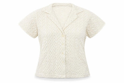 Front view of Nouveau Edition women’s beige basic button-up, size M
