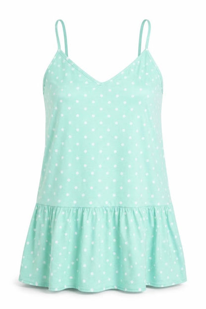 Front view of In the Style women’s green polka dot basic tank, size UK 8