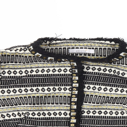 Close-up detail of Per Una women’s black striped jacket, size UK 8