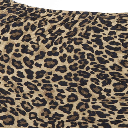 Brand and care label for H&M women’s brown animal print basic blouse, size 2XL