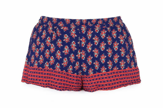Front view of Boohoo women’s blue floral shorts, size UK 8