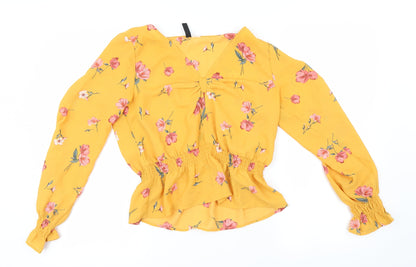 Front view of H&M women’s yellow geometric basic blouse, size UK 8