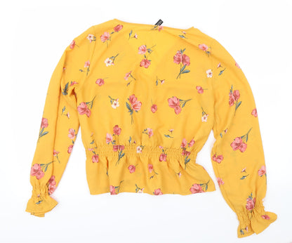 Back view of H&M women’s yellow geometric basic blouse, size UK 8