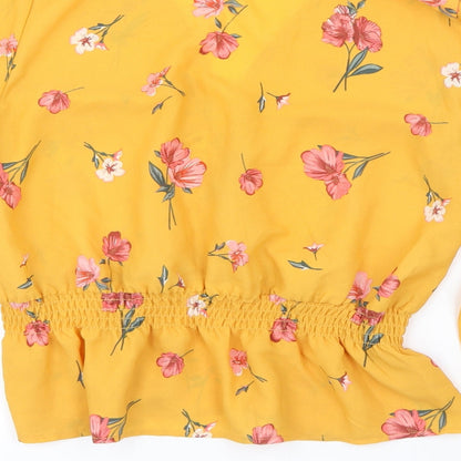 Brand and care label for H&M women’s yellow geometric basic blouse, size UK 8