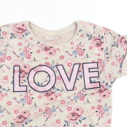 Close-up detail of Primark girls’ beige basic t-shirt, size 7-8, years