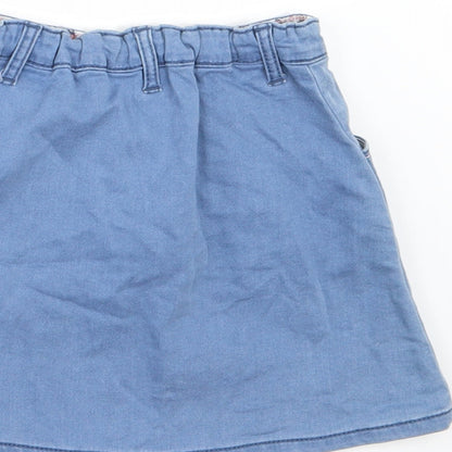 Brand and care label for Nutmeg girls’ blue floral denim a-line skirt, size 4-5, years