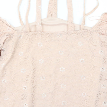 Brand and care label for River Island women’s pink floral basic blouse, size UK 6