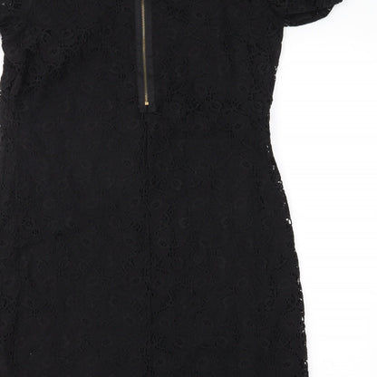 Brand and care label for Evie women’s black lace shift, size UK 14