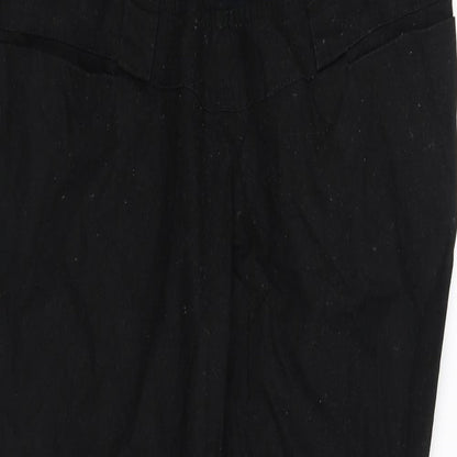 Close-up detail of pre worn women’s black trousers, size L, 32-inch leg