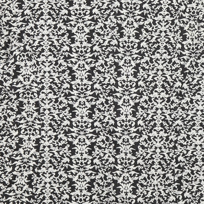 Brand and care label for Next women’s black floral jacket, size UK 16