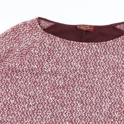 Close-up detail of Next women’s purple houndstooth jumper, size UK 12