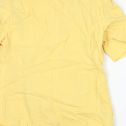 Brand and care label for Crepe Couture women’s yellow jacket suit jacket, size UK 10
