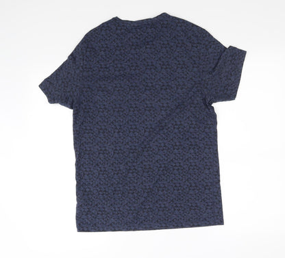 Back view of burton menswear women’s blue basic t-shirt, size S