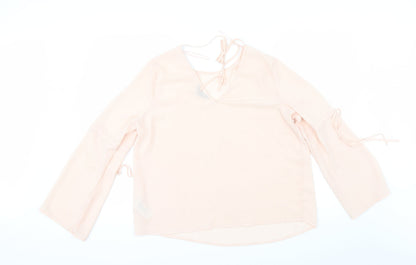 Back view of New Look women’s orange tunic blouse, size UK 14