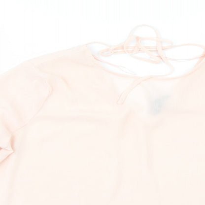 Close-up detail of New Look women’s orange tunic blouse, size UK 14