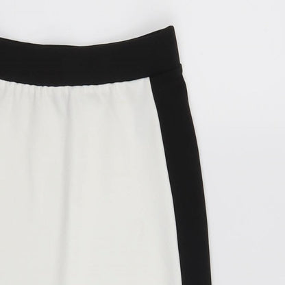 Close-up detail of New Look women’s white skort skirt, size UK 4