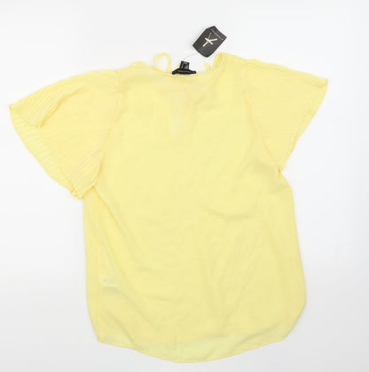 Back view of Primark women’s yellow basic blouse, size UK 10