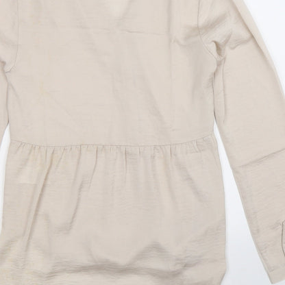 Brand and care label for H&M women’s silver basic button-up, size UK 8