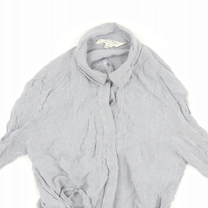 Close-up detail of Miss Selfridge women’s blue striped basic button-up, size UK 8, - open back