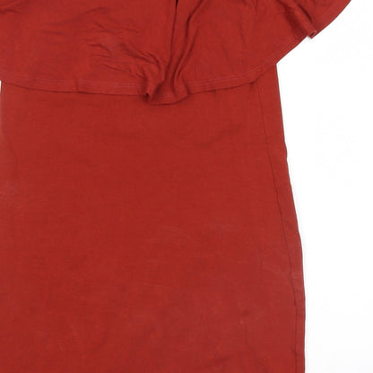 Brand and care label for Miss Selfridge women’s orange basic blouse, size UK 10