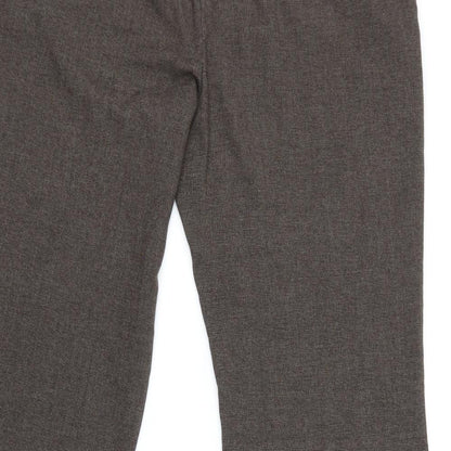 Brand and care label for Moda women’s brown trousers, size UK 16