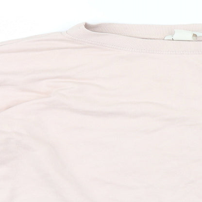 Close-up detail of H&M women’s pink jumper, size UK 10