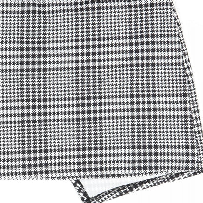 Brand and care label for SHEIN women’s white check mini skirt, size L
