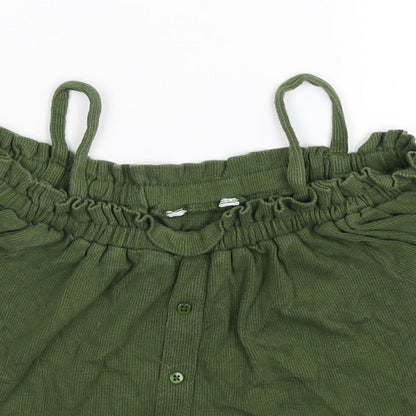 Close-up detail of Primark girls’ green basic tank, size 10, years