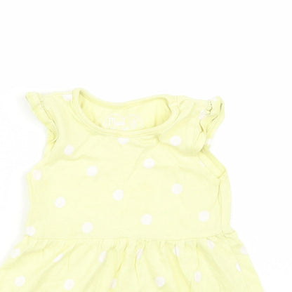 Close-up detail of Made for Life girls’ yellow polka dot basic t-shirt, size 2, years