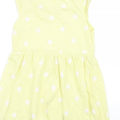 Brand and care label for Made for Life girls’ yellow polka dot basic t-shirt, size 2, years