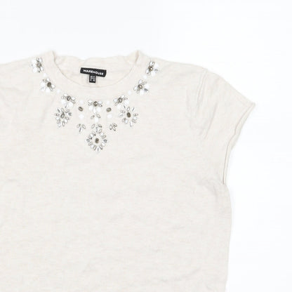 Close-up detail of Warehouse women’s ivory knit jumper, size UK 14, - beaded