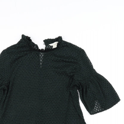 Close-up detail of H&M women’s black basic blouse, size UK 6