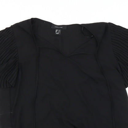 Close-up detail of Atmosphere women’s black basic blouse, size UK 12