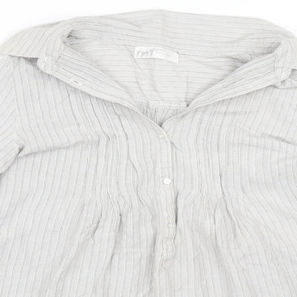 Close-up detail of Internationale women’s silver shirt dress, size UK 14
